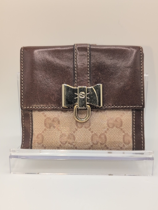 Gucci Handbags - Gucci GG Canvas Bow-Front Wallet